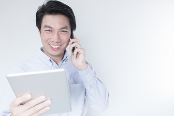 Young male using digital tablet