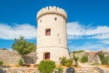 Fototapeta na wymiar Old defense tower fortress in town of Cres, Kvarner, Croatia