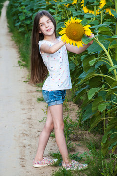 girl on the field of sunflowers