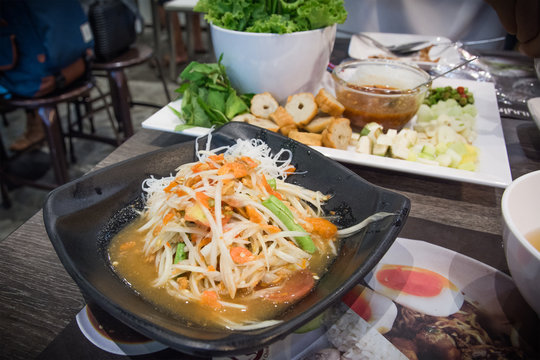 hot and spicy papaya salad with crab on table,thai cuisine