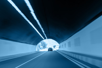 Abstract Motion Blur Background road tunnel with moving cars and