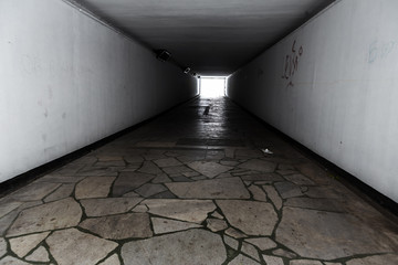 Empty underpass tunnel. Svetv end of the tunnel. As an abstract