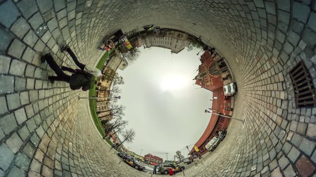 People Walking by Paving Stones vr Video 360 Little Planet Video Walkers Are Crossing the Square Green Grass Cityscape Vintage Buildings Cloudy