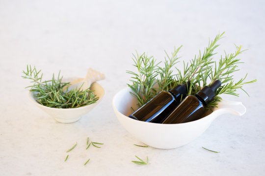 Rosemary aromatherapy essential oils in bottles