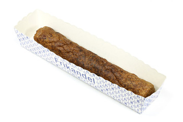 traditional Dutch frikandel in a cardboard container isolated on white background