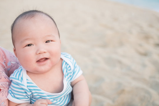 cute babay smile happily