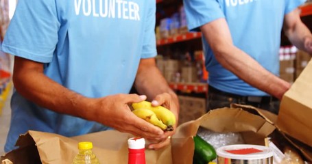 Warehouse worker doing a charitable work 