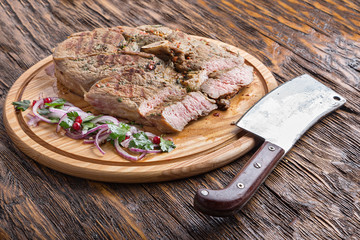 ribeye steak on a board