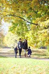 Family in autumn park
