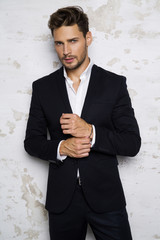 Portrait of sexy man in black suit