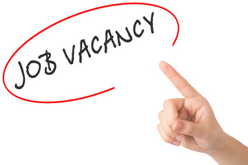 Hand of a young girl points to a word