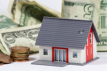 Modellhaus und Geld