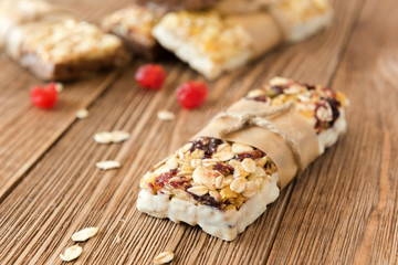 Sweet bars with a chocolate, rise and cranberry