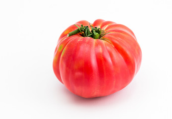 Coeur De Boeuf tomato or Bull's Heart tomato isolated on white background.