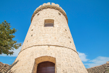 Fototapeta na wymiar Old defense tower fortress in town of Cres, Kvarner, Croatia 