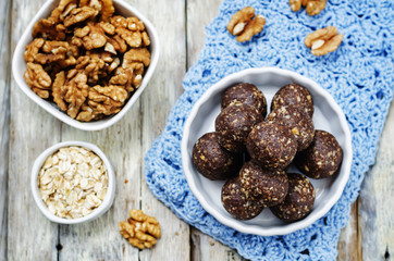 Dates cocoa coconut oats walnuts raw vegan balls