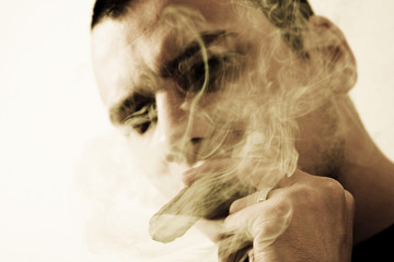 Man behind smoke