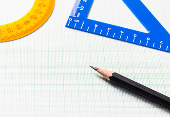Pencil and Ruler on green graph paper with copy space , Selectiv