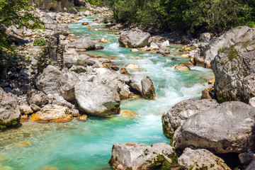 Naklejka na ściany i meble Beautiful turquoise river in the Triglav National Park in Slovenia