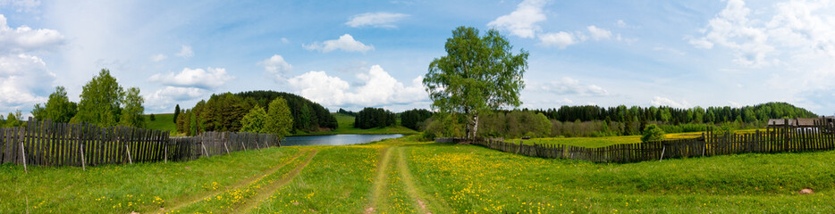 Fototapeta na wymiar Village with pond in Russia