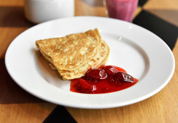 Pancakes with strawberry jam