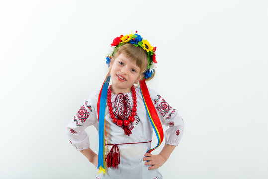 Girl in the Ukrainian national native costume/Beautiful Ukrainian girl in the Ukrainian national native costume on Slavic holiday