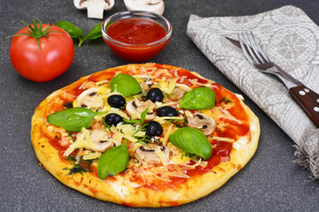 Pizza with Mushroom, Cheese, Mozzarella, Olives and Basil 