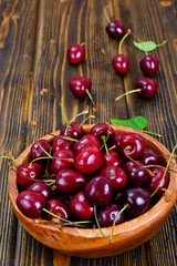 Fresh Cherry in Wooden Bowl
