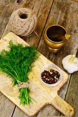 Fresh Juicy Dill on Wooden Background