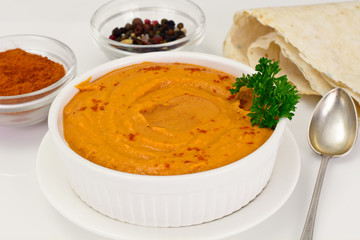 Hummus with Curry, Turmeric, Raw Chickpeas on the White Backgrou