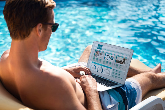 Pleasant man surfing the Internet