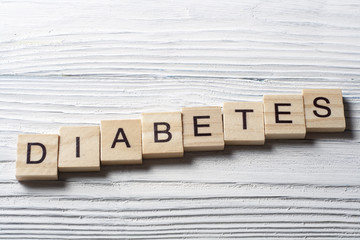 word diabetes on wooden cubes at wood background