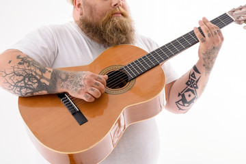 Man playing a guitar