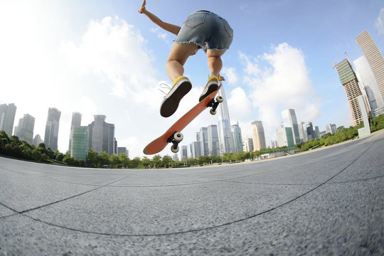 skateboarder skateboarding at city