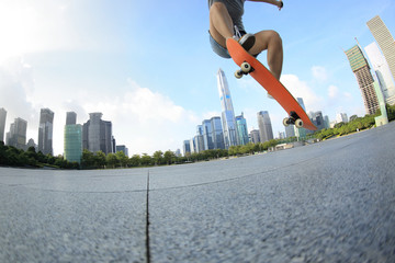 skateboarder skateboarding at city