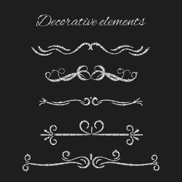 Silver text dividers set. Ornamental decorative elements. Vector ornate elements design. Silvery flourishes. Shiny decorative hand drawn borders with glitter effect.