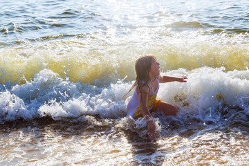 Fototapeta premium beautiful little swimming in the ocean
