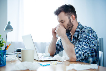 Portrait of ill businessman with fever and running nose - obrazy, fototapety, plakaty
