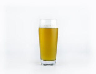 Glass of light beer isolated on a white background
