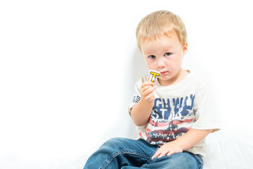 Young Shy And Uncertain American Blond Boy