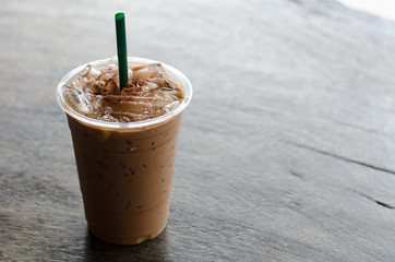 Ice latte coffee on wooden table