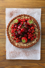 Chocolate tart decorated with fresh berries