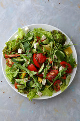 Vegetables salad with crisp arugula