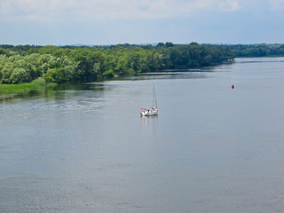 Fototapeta na wymiar Sailing yacht on the Dnieper River