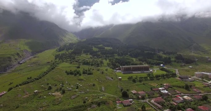 Aerial view of Rooms hotel Kazbegi and small village. Kazbegi, Stepantsminda; July 2016. Georgia