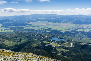 Fototapeta na wymiar City (Strbske Pleso) and Lake (Strbske pleso) in Slovakia.