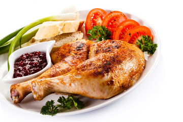 Roasted chicken legs and vegetables 