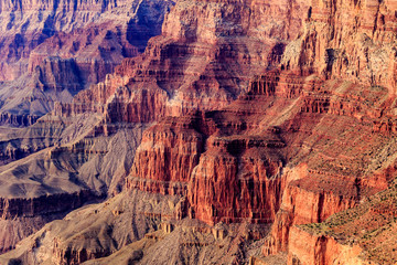 Towering, rocky cliffs exhibit their brilliant color in the eastern Grand Canyon
