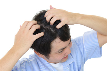 Fototapeta premium ヘアーセットに不満な男性