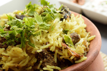Spicy Camel Biryani Cooked with Parboiled Basmathi Rice, Indian Spices with Garam Masala.